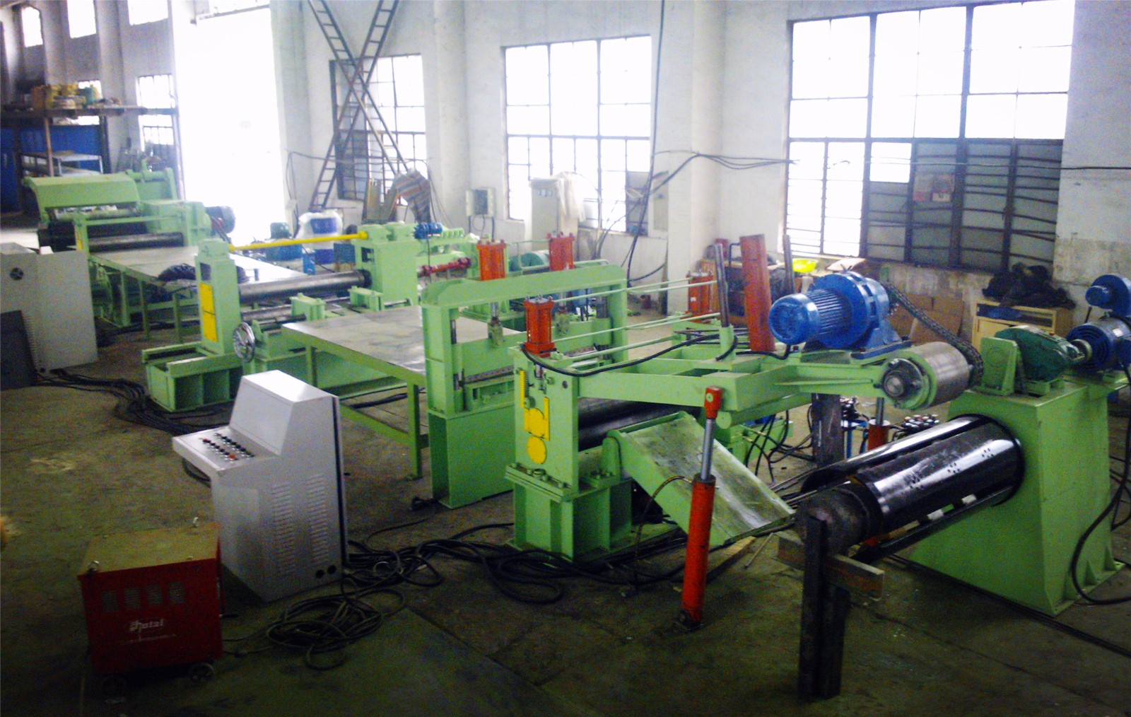 Slitting hidraulico, Linea corte longitudinal hidraulica para produccion intermedia